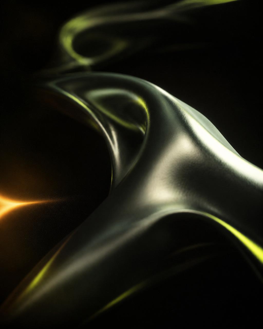Abstract chrome sculpture lit by a thin lime rim light